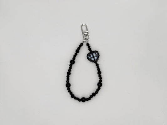Black beaded keychain wrist strap with gingham heart charm and silver swivel clip